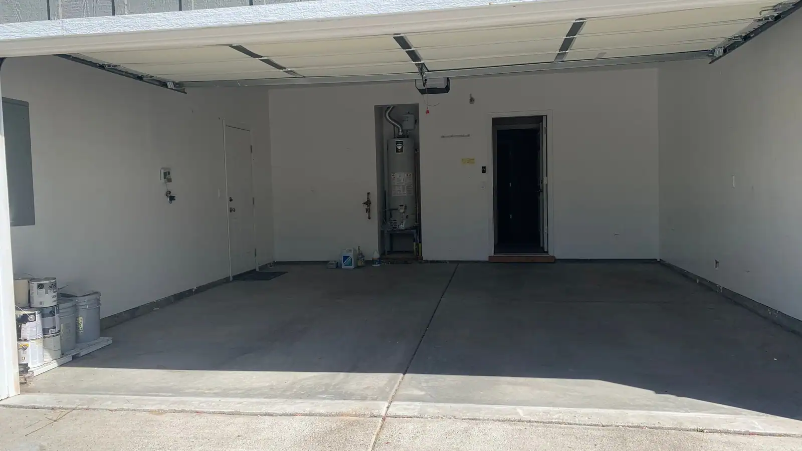 A two-car garage cleared out down to the bare floor